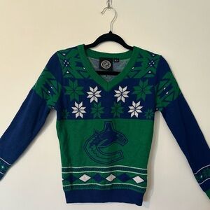 NHL Green and Blue Vancouver Canucks Hockey Sweater Size M
Casual Fitted Comfort